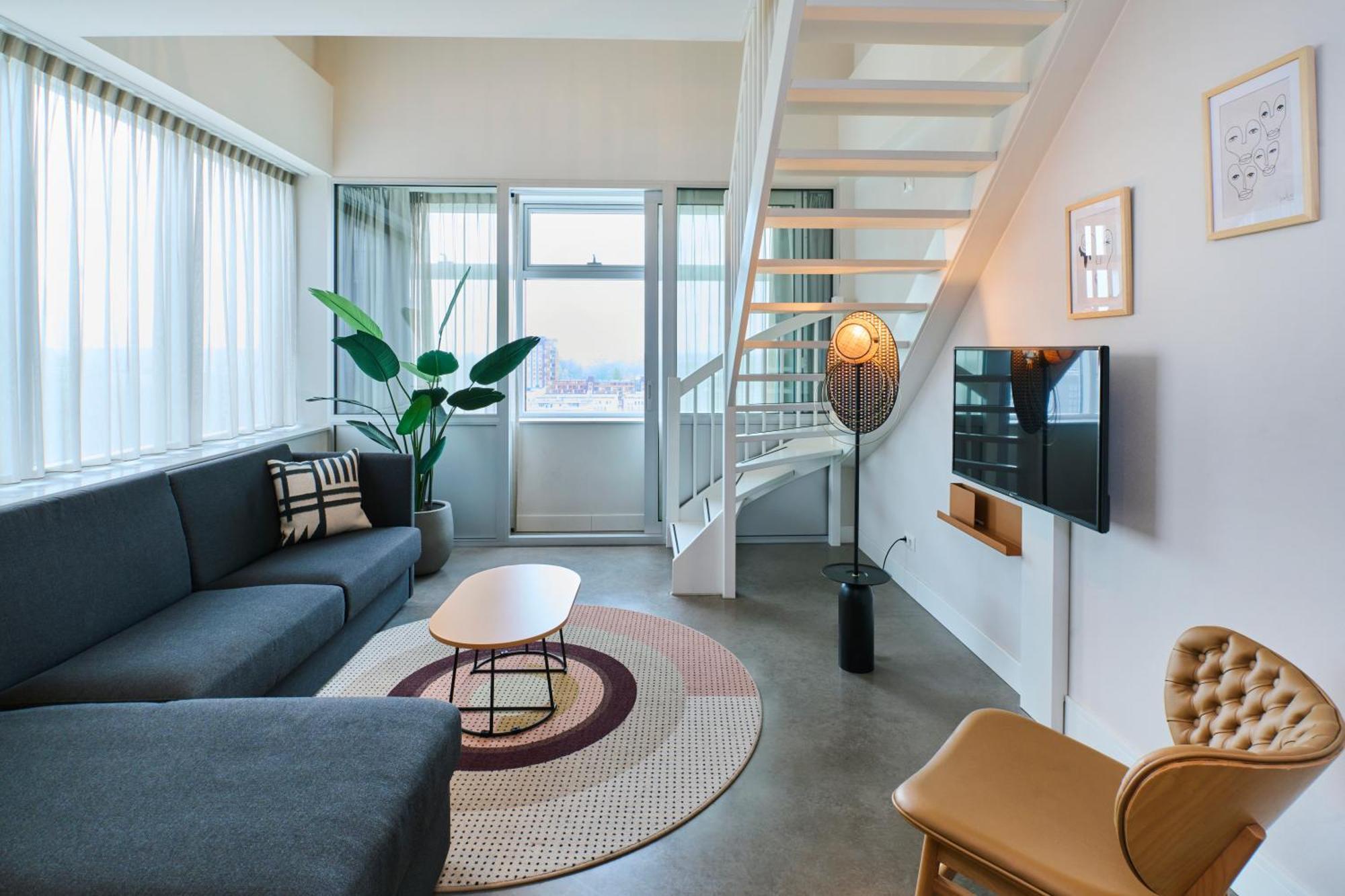 1-Bedroom Loft with Patio,1581088327:JPEG